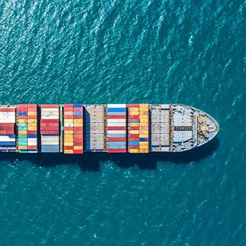 Aerial view of container ship at sea