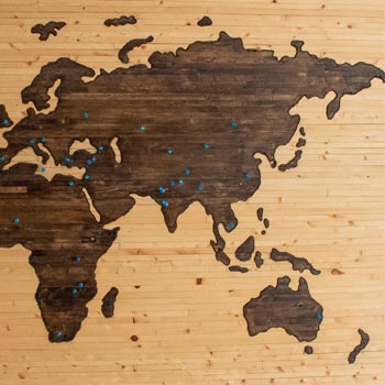 Wooden world map showing Europe, Africa, Asia and Oceania